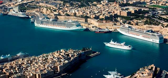 Seen from left Prinsendam, MSC Splendida, Island Sky, MSC Musica, Coral and Seven Seas Navigator. Image by Custom Aerial Photos
