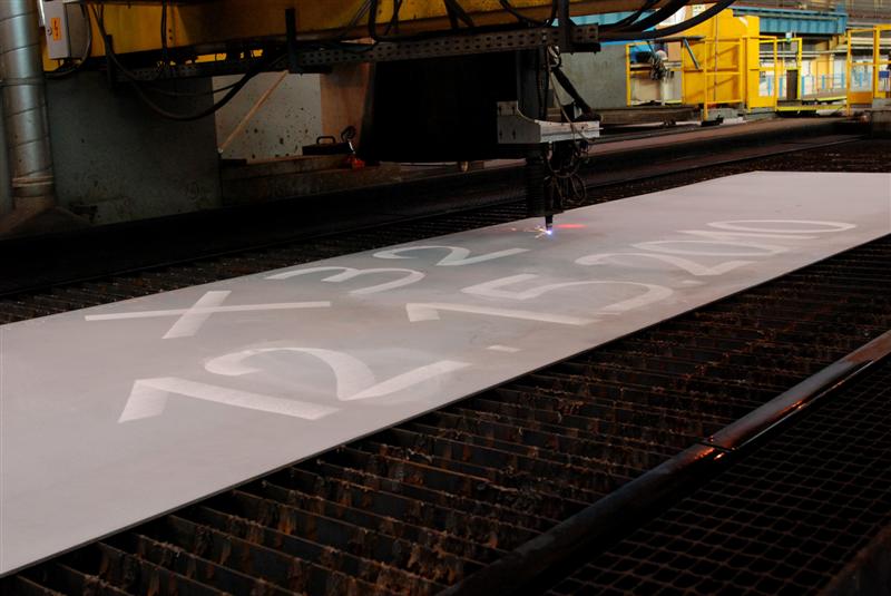 Plasma cutting of a steel piece for panel # 2210 of X32