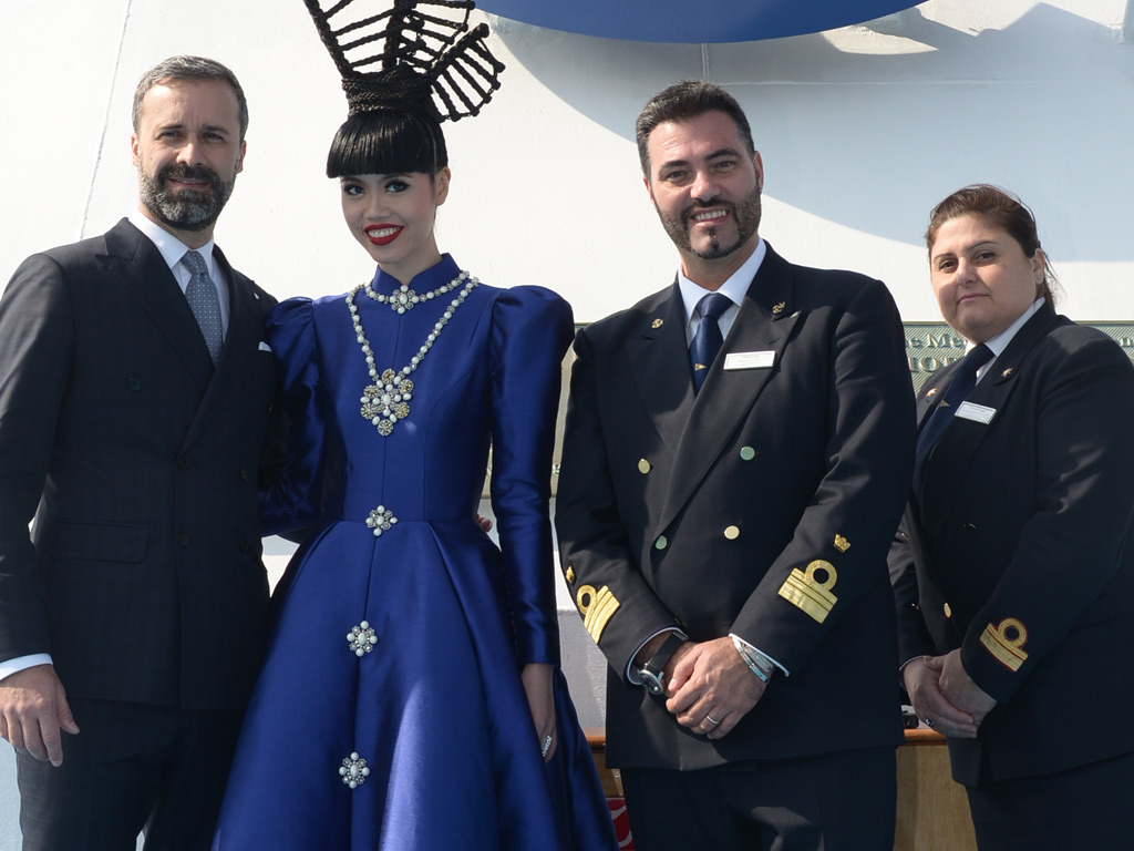 Mario Zanetti, CEO of Carnival Asia, catwalk producer and model Jessica Minh Anh, Captain of Costa neoRomantica and Hotel Director are taking group photo before the J Winter Fashion Show.