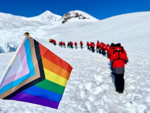 Guests planting the pride flag