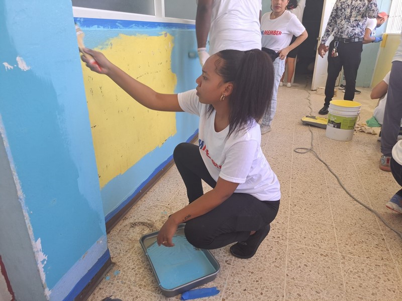 Crew members paint St. Ann's Bay Regional Hospital Pediatric Learning Centre