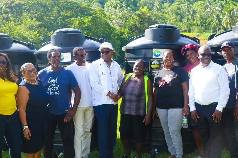 The Minister of Tourism, Hon. Edmund Bartlett, presented South Trelawny farmers with 50 650-gallon water storage tanks in Ulster Spring on Saturday, September 2, 2023.