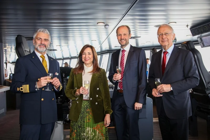 Captain Andrea Catalani, Christine Duffy, Jan Meyer and Bernard Meyer toast to the delivery of Carnival Jubilee