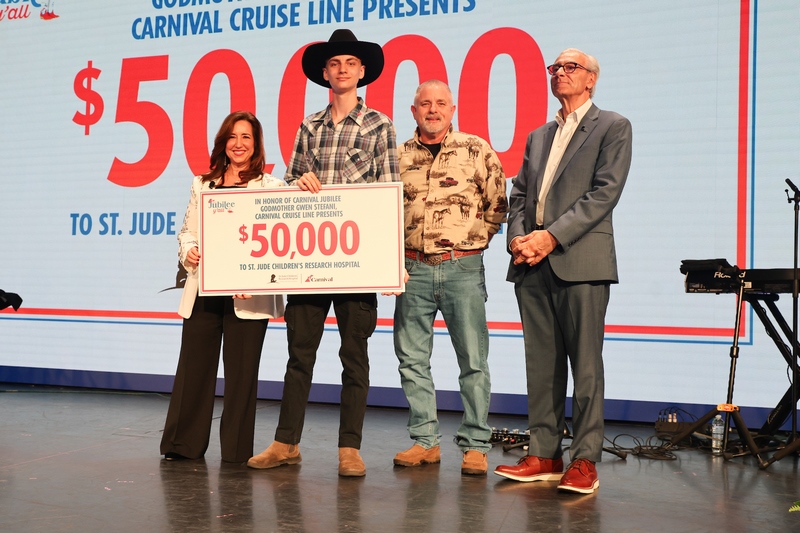 Carnival's President Christine Duffy pictured with Richard C. Shadyac, Jr. ALSAC President and CEO along with St. Jude patient Ty, diagnosed with retinoblastoma, and his dad