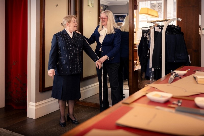 Caption: Captain Inger Thorhauge, who will be at the helm for Queen Anne’s maiden voyage, at a fitting with Kathryn Sargent