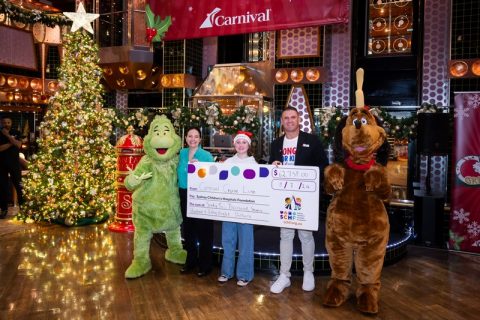 Carnival presenting a cheque to the SCHF - L-R The Grinch, SCHF CMO Kate Ferguson, Carnival Splendor Goddaughter Matilda Jenkins, Carnival Splendor Cruise Director Simon London, Max
