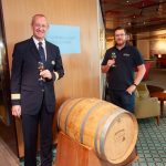 Adnams' Bradley Adnams with Fred. Olsen Cruise Lines Hotel Manager Iain Gibson