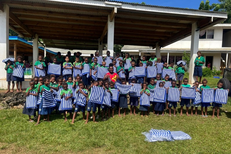 Children with towels donated by Carnival