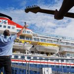 Four Worried Men performing on quayside